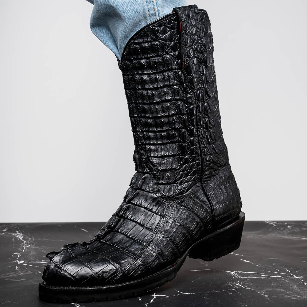 The Marlboro Black by Marco Di Milano: black hornback caiman cowboy boots with a crocodile skin pattern and low heels, shown on a white background.