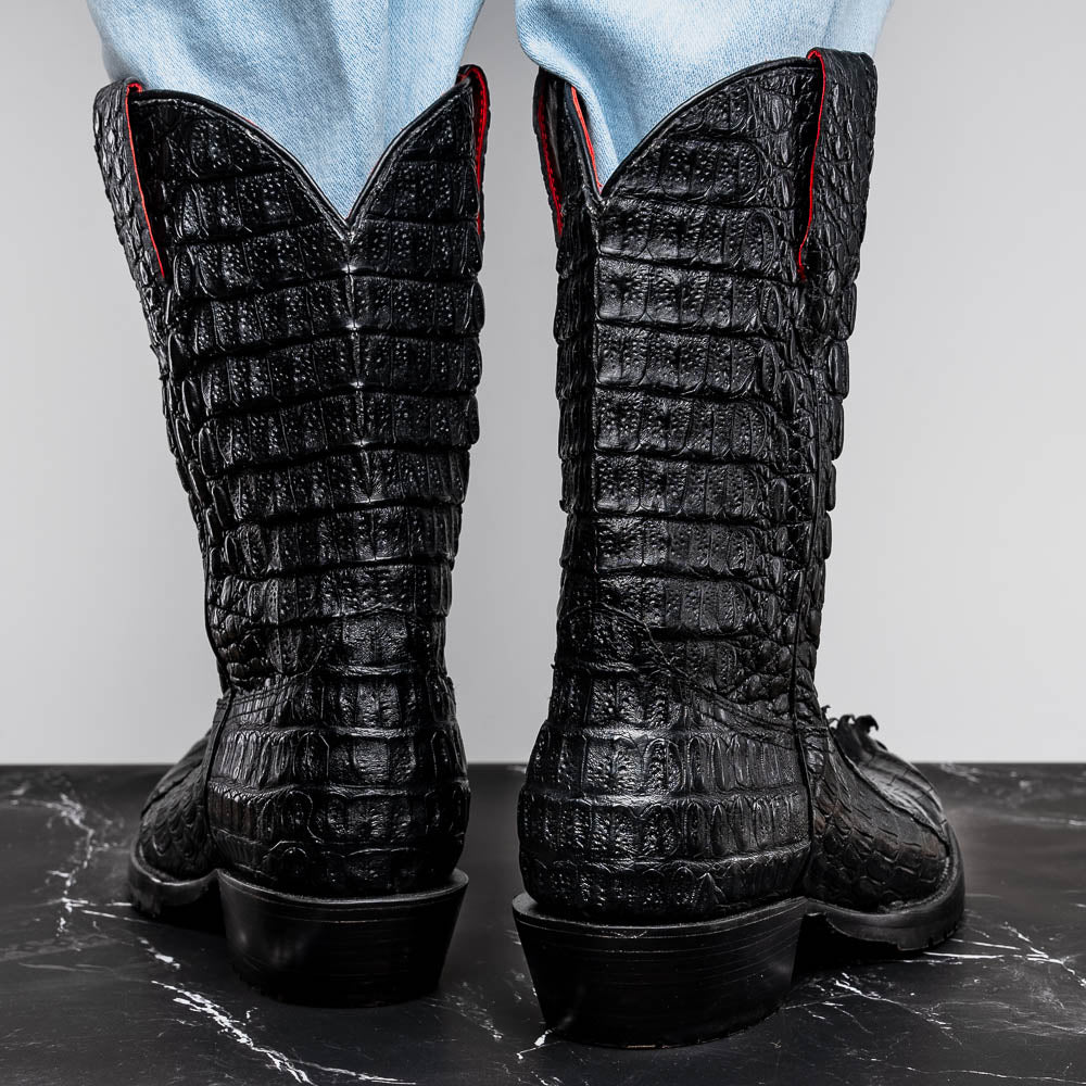The Marlboro Black by Marco Di Milano: black hornback caiman cowboy boots with a crocodile skin pattern and low heels, shown on a white background.