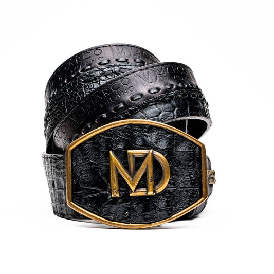 The Marco Di Milano Montana Belt Black features handcrafted black textured leather and a large gold MD monogram buckle, elegantly coiled against a white background.