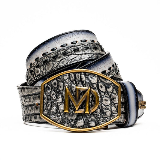 The Montana Belt Stone Gray by Marco Di Milano is a handcrafted leather belt, featuring a gold MD logo buckle and embossed branding on the caiman crocodile strap.