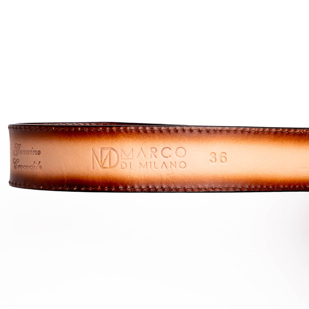 The Montana Belt Stone Brown by Marco Di Milano is a handcrafted western leather belt with a caiman crocodile pattern and a bold gold "MD" buckle.