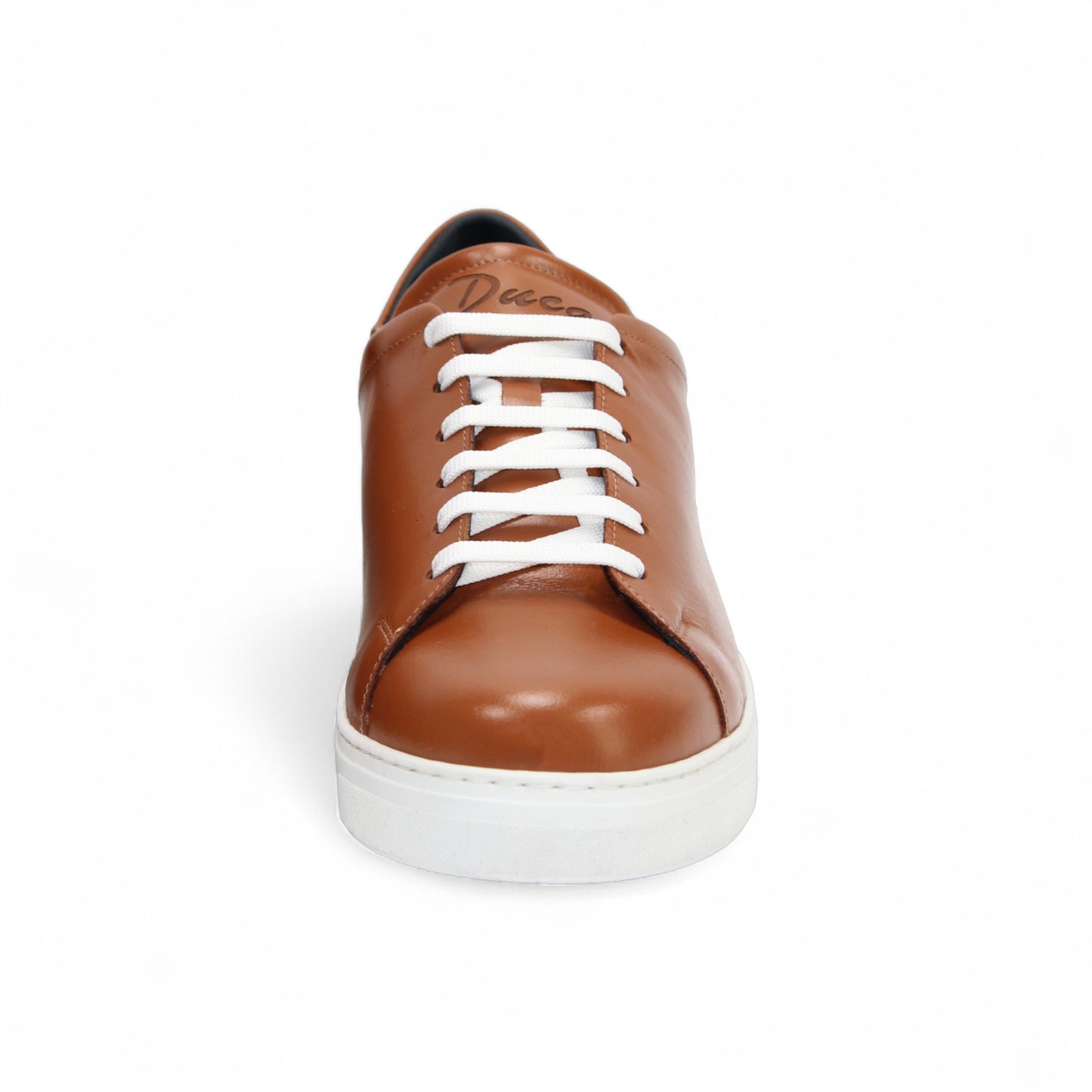The Duca Monza Ambra by Duca Di Matiste is a brown genuine leather low-top sneaker with white laces and a white rubber sole, displayed in profile on a plain white background—ideal for everyday elegance.