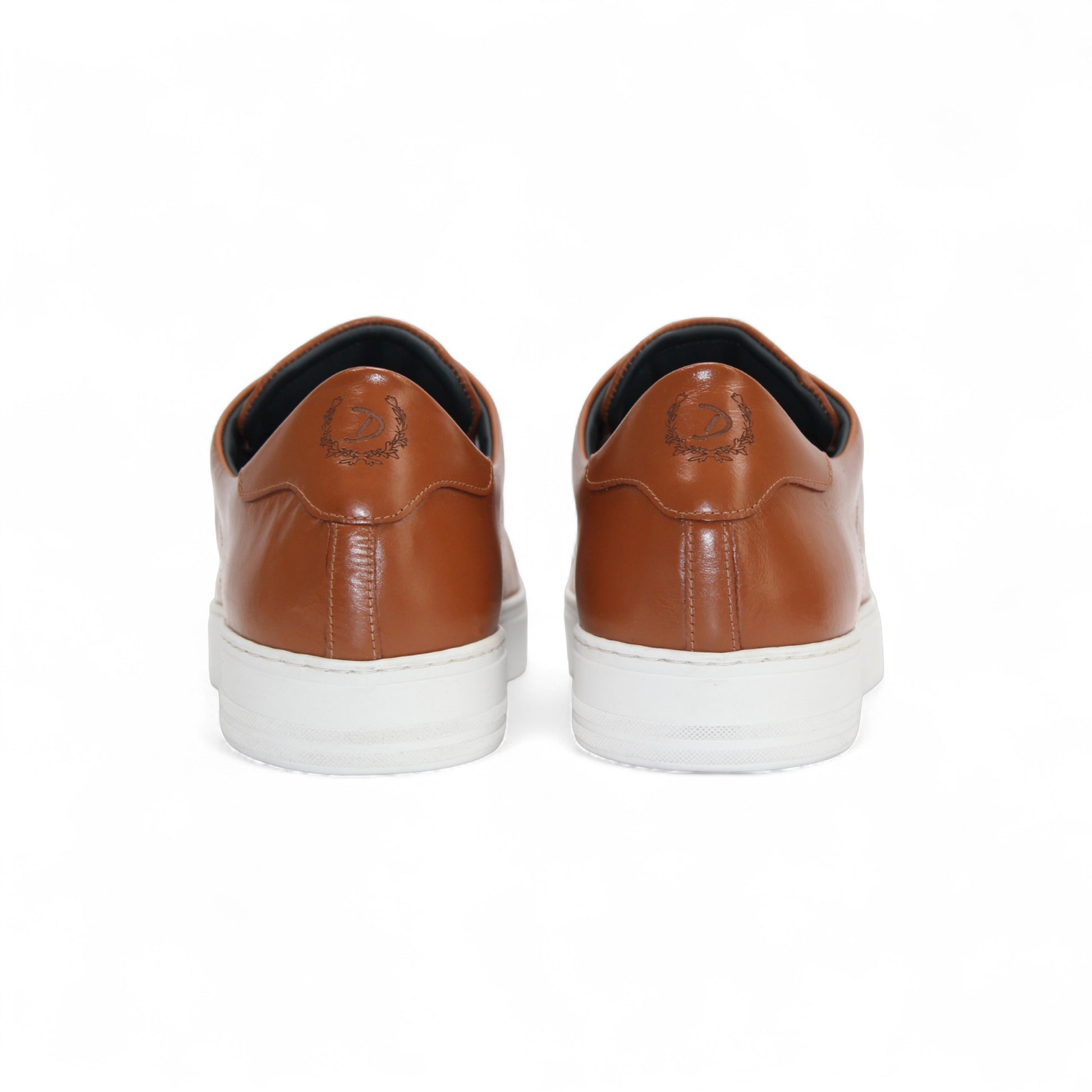 The Duca Monza Ambra by Duca Di Matiste is a brown genuine leather low-top sneaker with white laces and a white rubber sole, displayed in profile on a plain white background—ideal for everyday elegance.