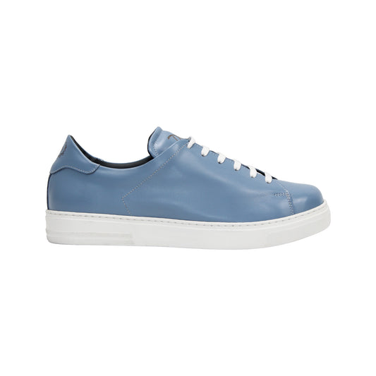 The Duca Monza Light Blue sneaker by Duca Di Matiste features genuine leather in light blue, white laces, and a thick white sole—an effortlessly versatile shoe that highlights Italian craftsmanship, shown in profile on a plain white background.