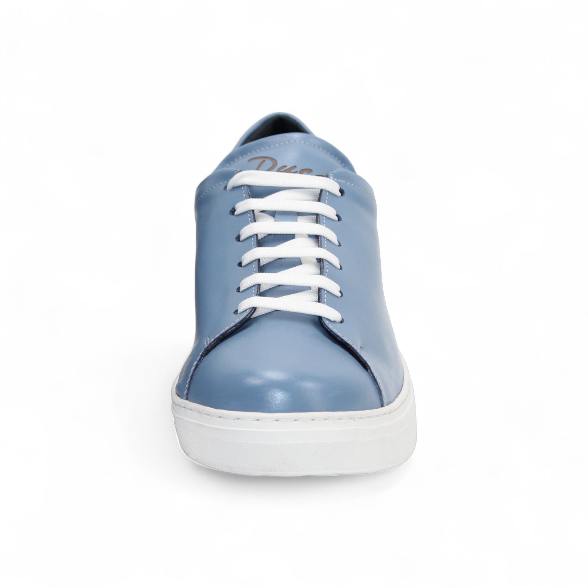 The Duca Monza Light Blue sneaker by Duca Di Matiste features genuine leather in light blue, white laces, and a thick white sole—an effortlessly versatile shoe that highlights Italian craftsmanship, shown in profile on a plain white background.