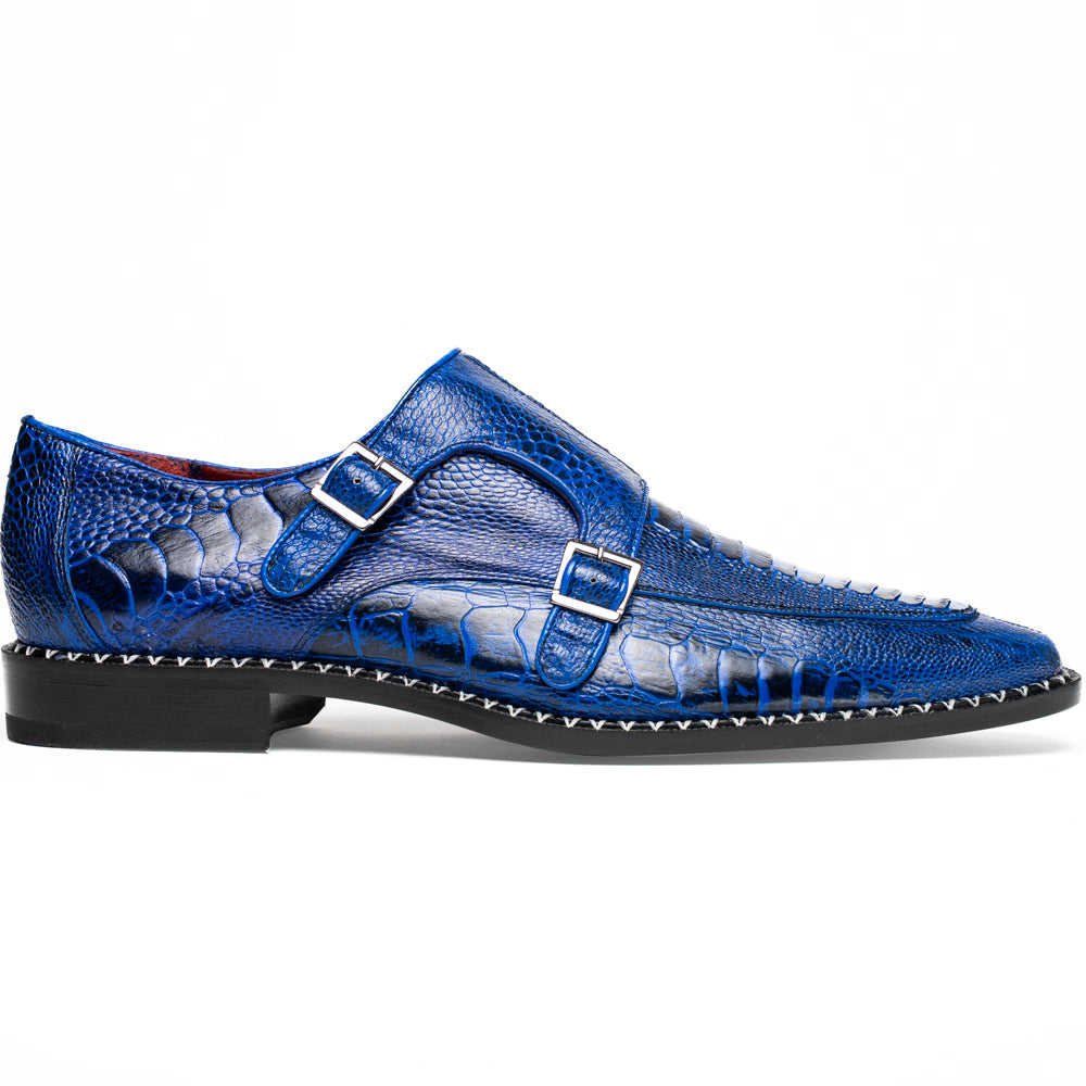 The Marco Di Milano Napoli Electric Blue exotic leather double monk strap shoes are shown: one upright and one on its side displaying the sole, set against a white background.