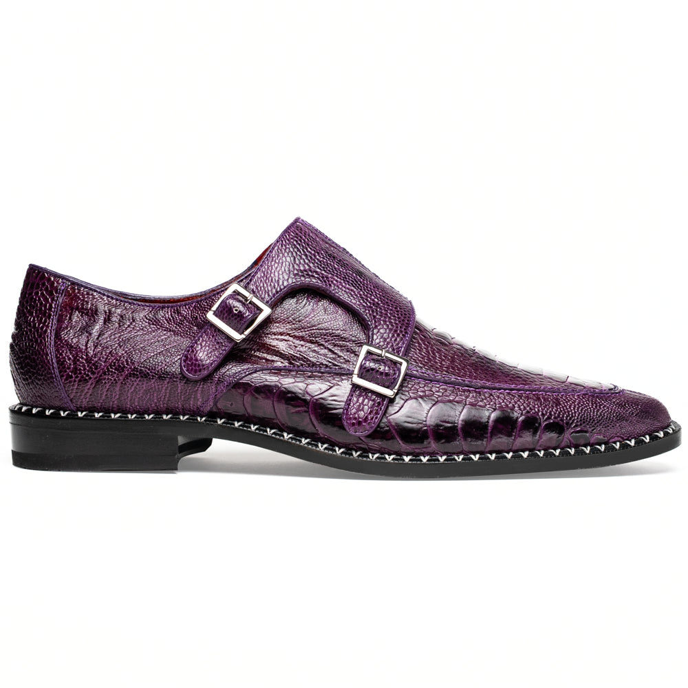The Marco Di Milano Napoli Purple dress shoes feature genuine ostrich leather, a double monk strap, and textured detailing, with one shoe shown on its side to highlight the sole.
