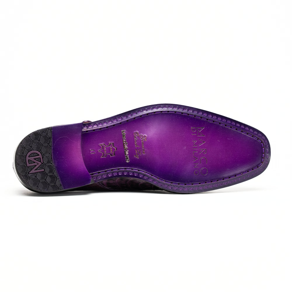 The Marco Di Milano Napoli Purple dress shoes feature genuine ostrich leather, a double monk strap, and textured detailing, with one shoe shown on its side to highlight the sole.