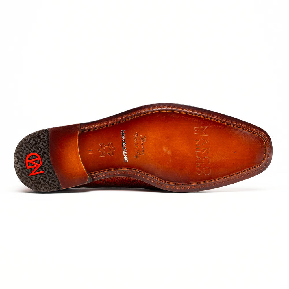 A pair of Marco Di Milano Napoli Rustic Cognac double monk strap dress shoes in genuine ostrich leg leather, with one shoe upright and the other on its side to show the sole.