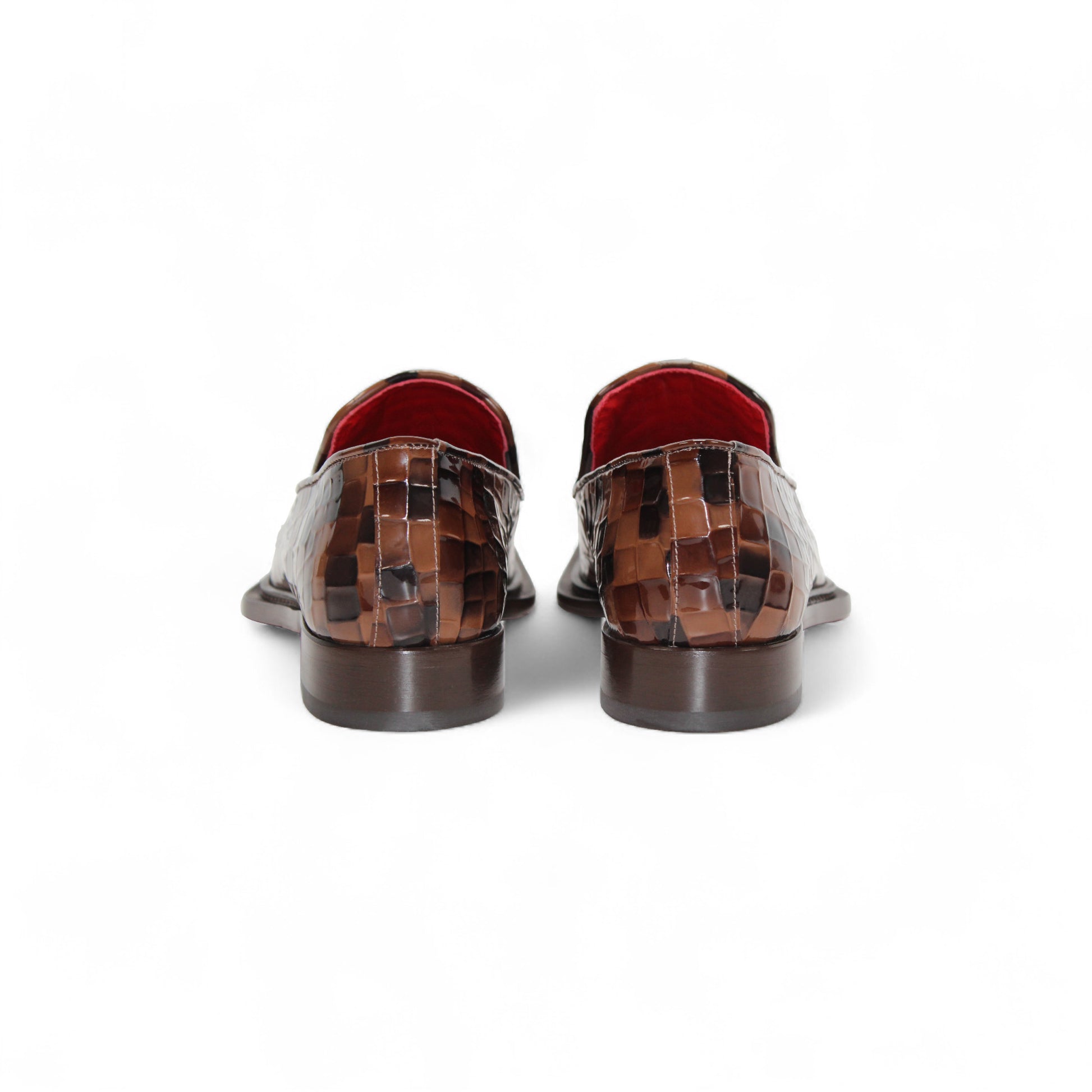 The Emilio Franco Couture Narciso Chocolate Combo loafer features a brown checkered croco print leather, decorative metal buckle, low heel, red lining, and is shown in side profile on a white background.
