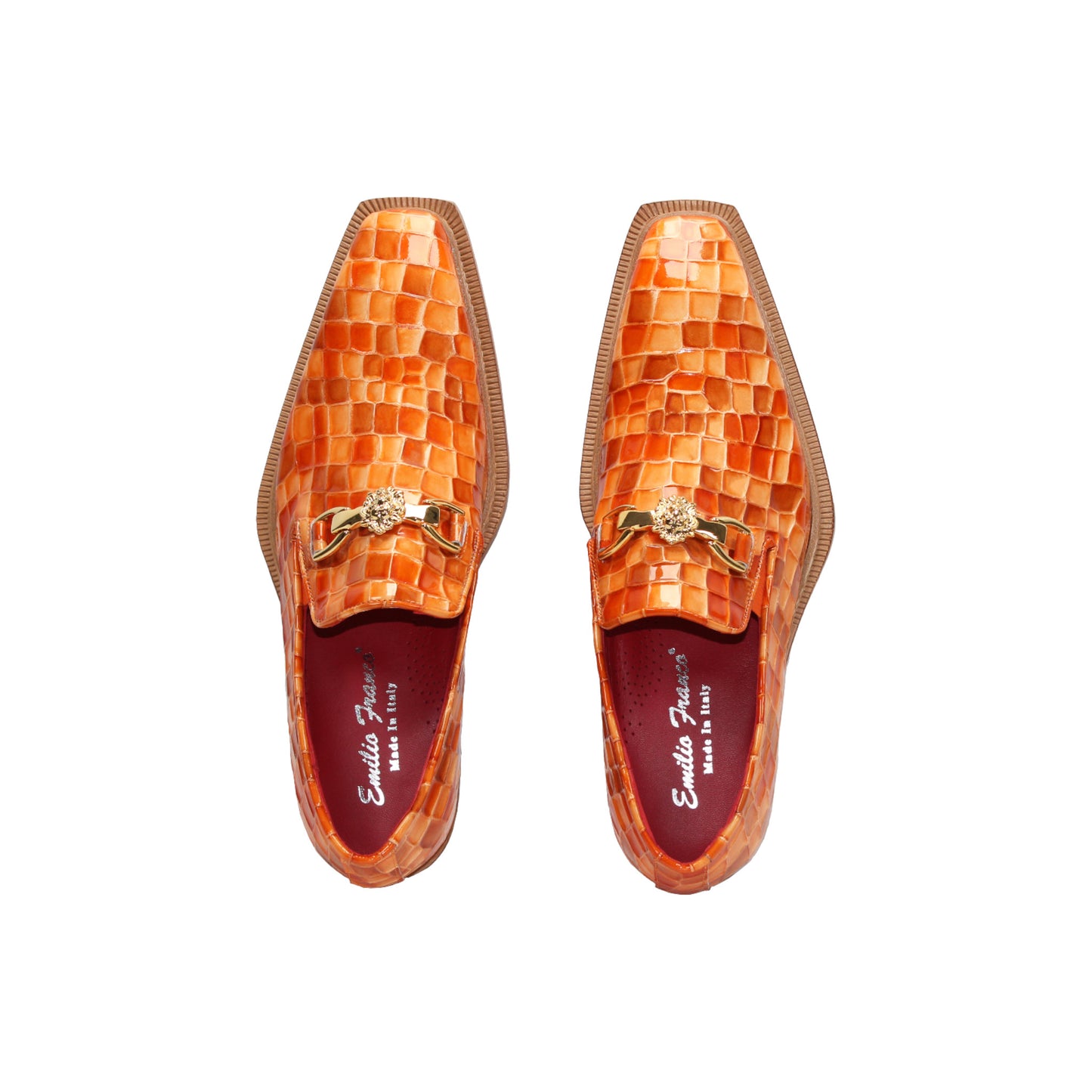 The Emilio Franco Couture Narciso Orange Combo loafer features orange woven leather, a gold buckle detail, and a low wooden heel—this bold designer shoe by Emilio Franco Couture stands out against a plain white background.
