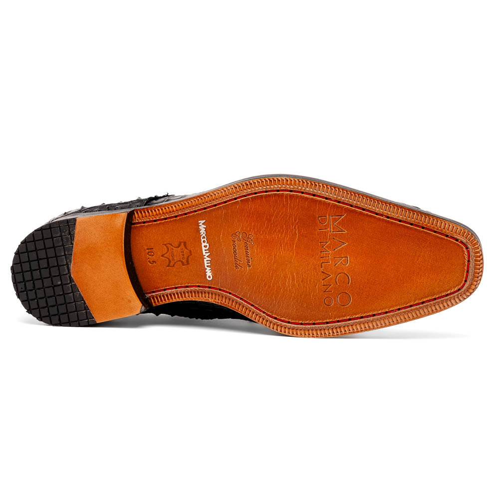 The Nilo Black by Marco Di Milano is a pair of luxury men's shoes made from polished black Nile crocodile skin with red inner lining and brown leather soles embossed with the brand name.