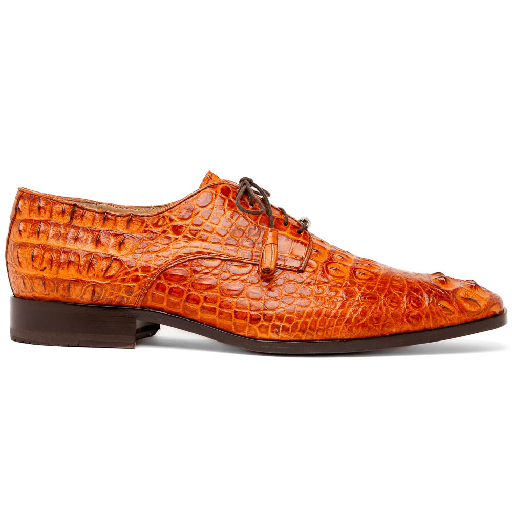 The Nilo Brandy by Marco Di Milano is a pair of orange luxury shoes made from Premium Nile Crocodile Skin with black laces—one shoe upright, the other flat to highlight its exquisite sole.