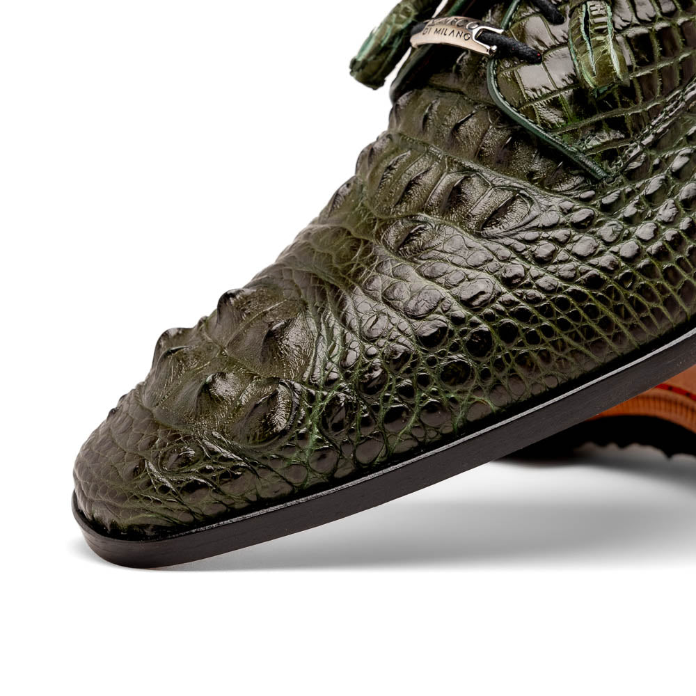 The Nilo Forest Green by Marco Di Milano is a luxury pair crafted from premium Nile crocodile skin in green, with black laces—one shoe upright, the other showing a branded brown leather sole.
