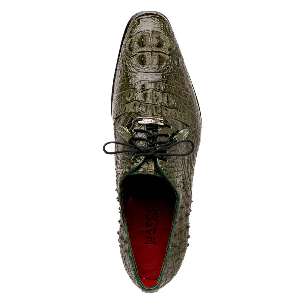 The Nilo Forest Green by Marco Di Milano is a luxury pair crafted from premium Nile crocodile skin in green, with black laces—one shoe upright, the other showing a branded brown leather sole.