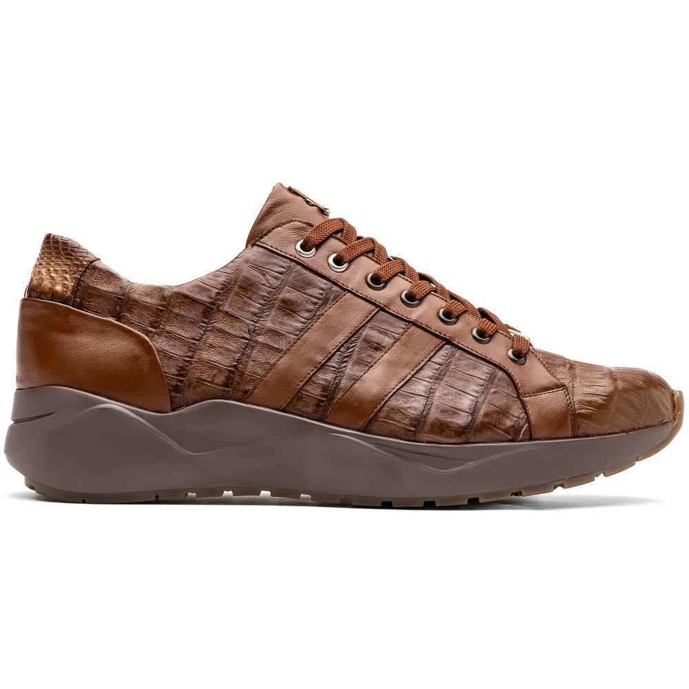 The Marco Di Milano Nino Bay Apache: luxurious brown genuine caiman crocodile sneakers, hand-painted with dark brown laces and grooved rubber soles—one stands upright while the other is shown lying on its side.