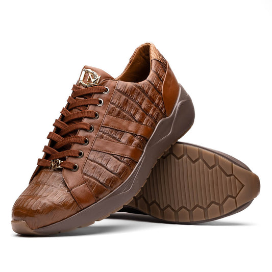 The Marco Di Milano Nino Bay Apache: luxurious brown genuine caiman crocodile sneakers, hand-painted with dark brown laces and grooved rubber soles—one stands upright while the other is shown lying on its side.