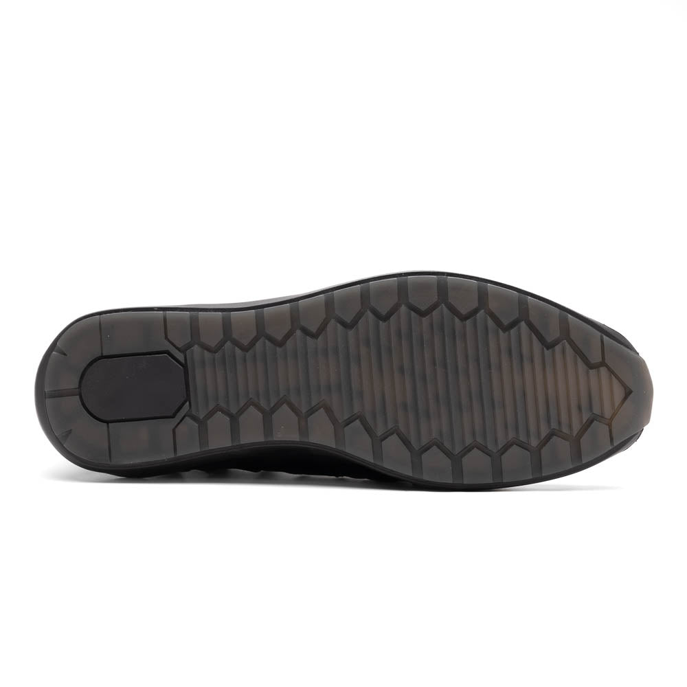 The Nino Black by Marco Di Milano: genuine black caiman crocodile sneakers with black laces and a textured rubber sole, one standing and one leaning, highlighting luxury footwear with a striking hand painted finish.