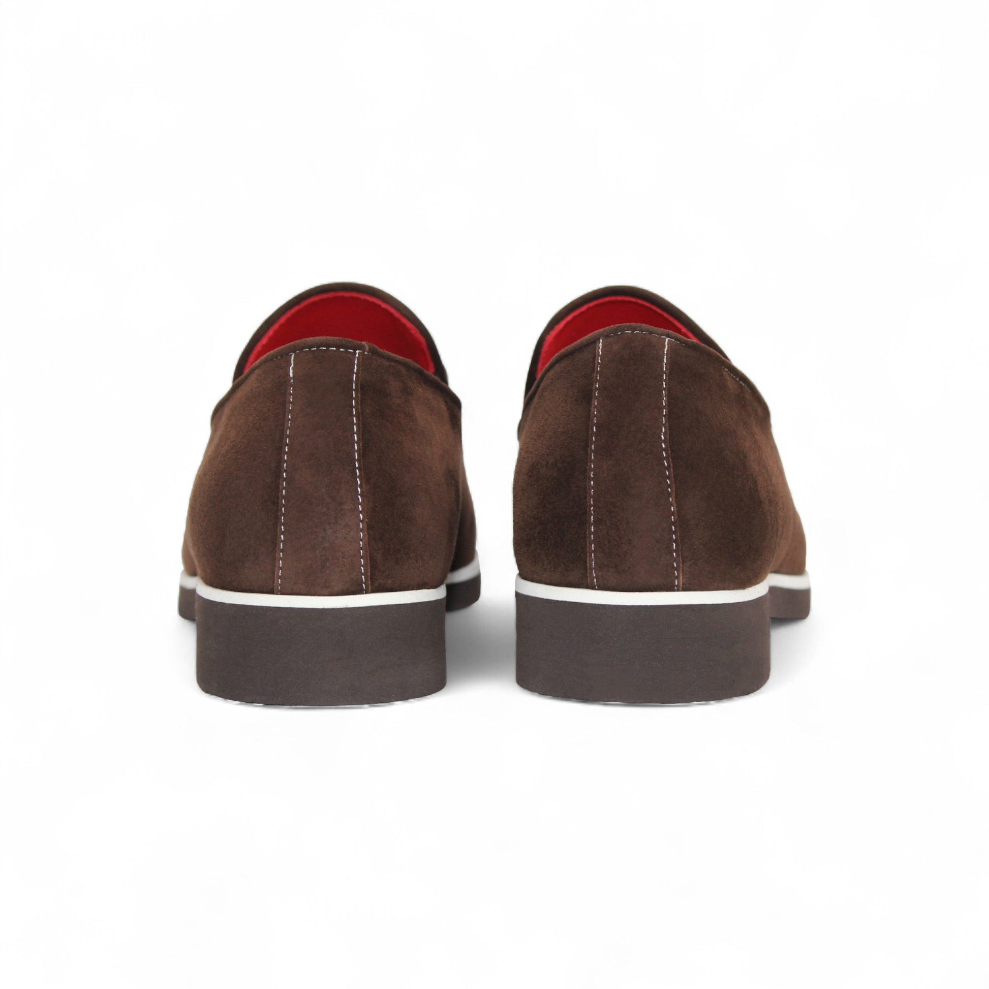 The Emilio Franco Nino II Dark Brown loafer by Emilio Franco features luxury Italian suede, a silver buckle detail, white stitching accents, and a flat dark sole.