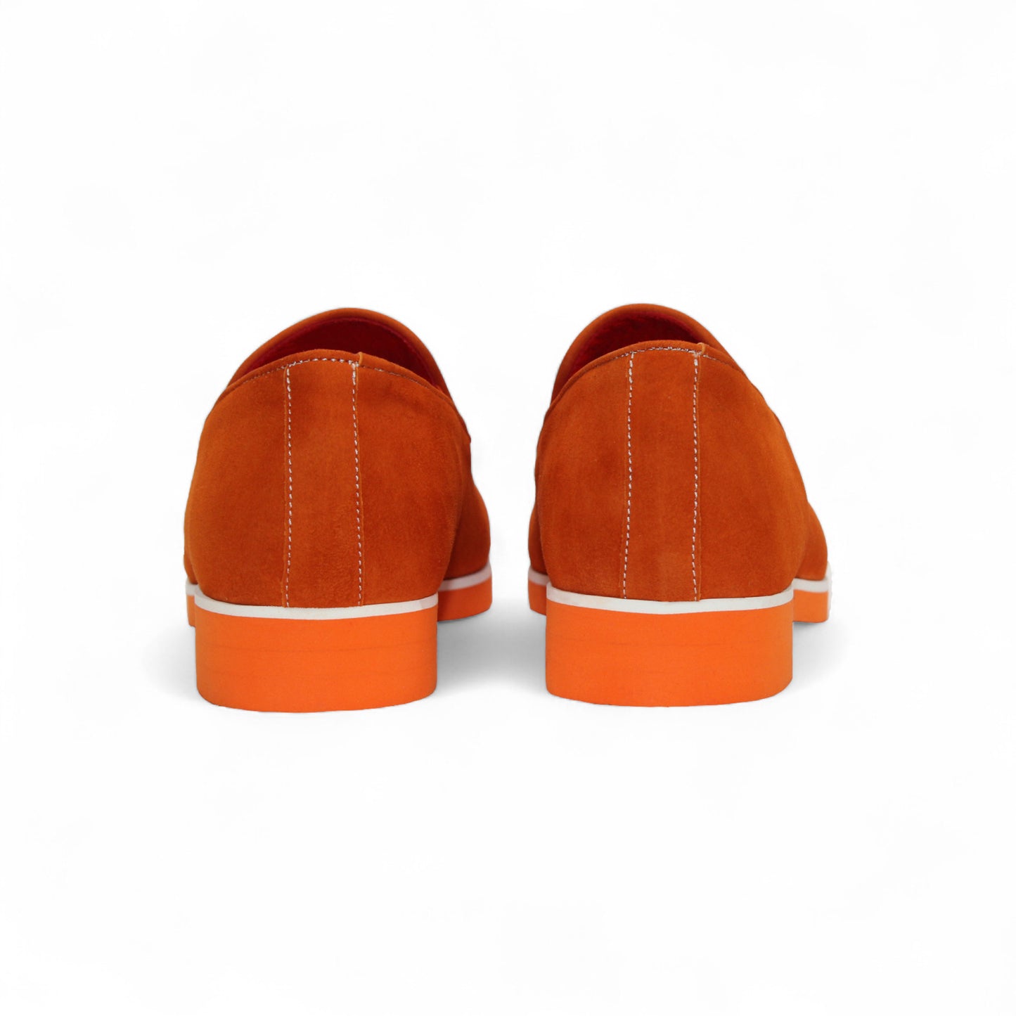 The Emilio Franco Nino II Orange by Emilio Franco is a bright orange suede loafer with white stitching, a silver buckle, and a matching orange sole, shown against a plain white background.