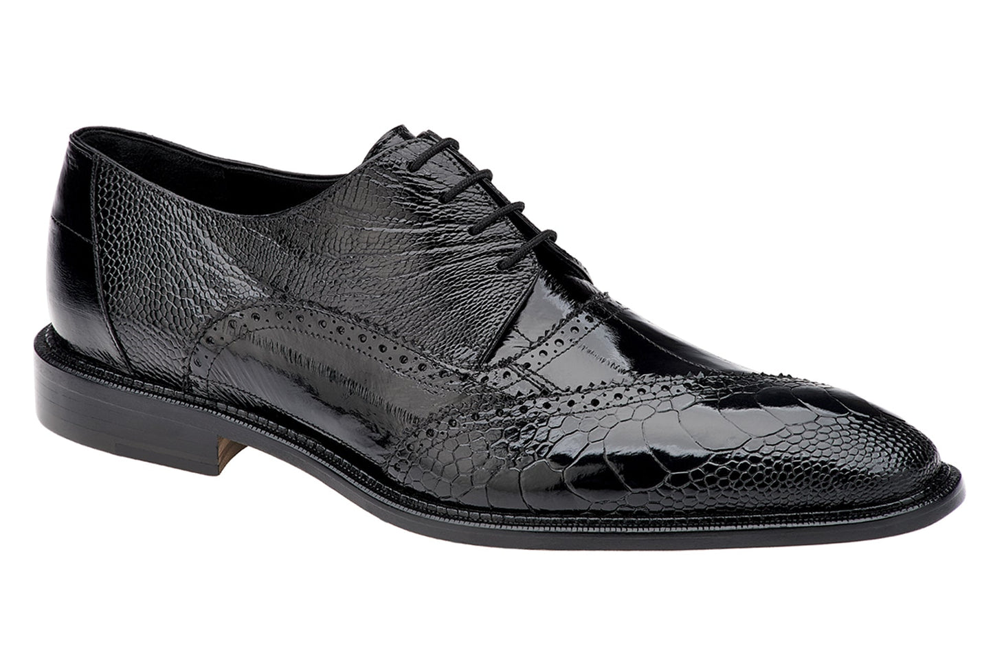 The BELVEDERE Nino dress shoe in black features genuine ostrich leg and eel leather, brogue detailing, a pointed toe, and low heel. Shown from the side on a white background.