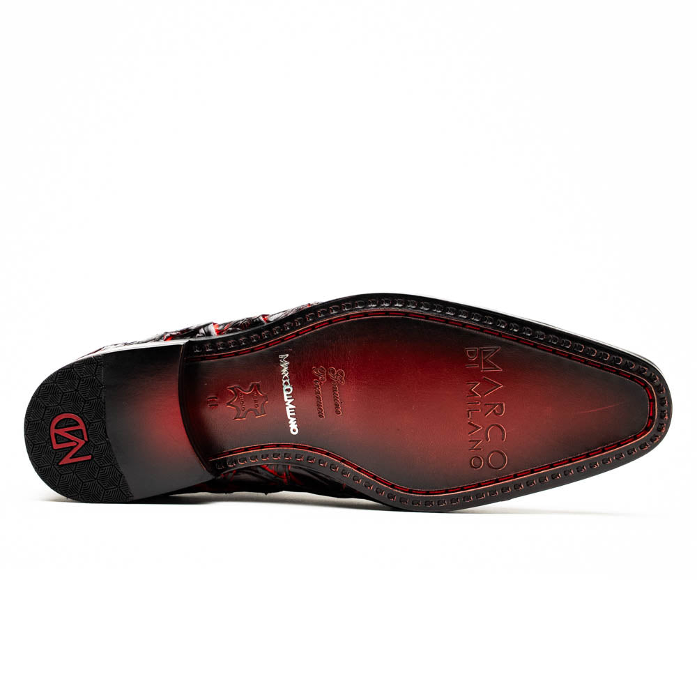 A pair of Marco Di Milano Olivieri Blackcherry oxfords—one upright, one on its side—displays the brand name on the sole, offering luxury men’s footwear with a strikingly exotic black and red pirarucu finish.