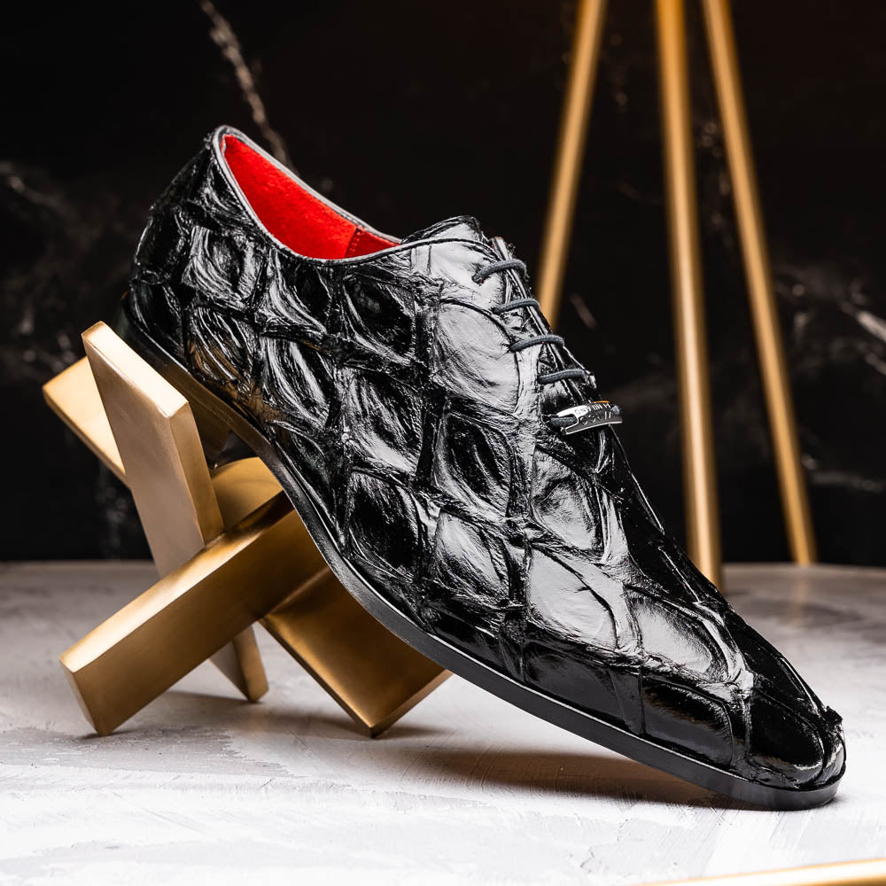 The Olivieri Black by Marco Di Milano: luxurious black crocodile-patterned leather oxfords with red interior lining, displayed to show off the striking brown sole—a true statement in designer footwear.