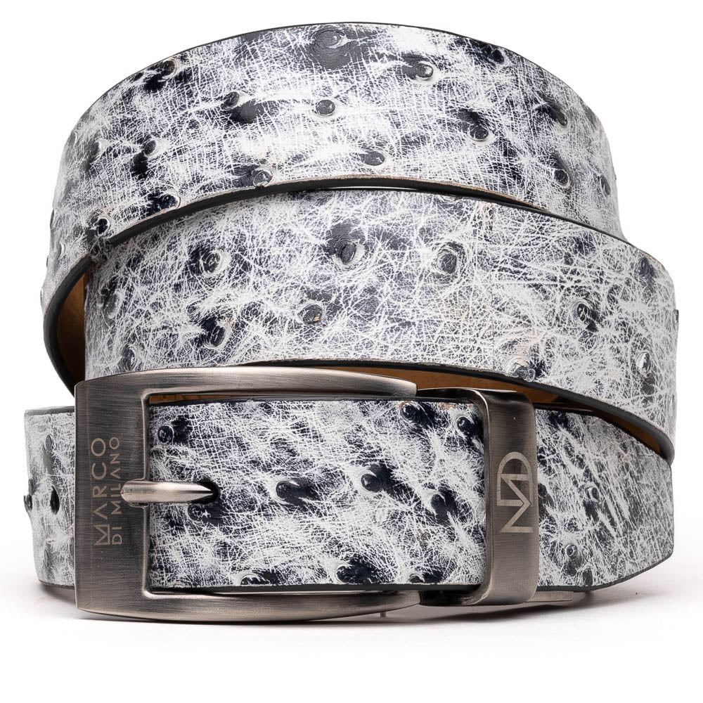 The Domenico Belt Antique Newspaper by Marco Di Milano features white and black textured leather, a silver engraved buckle, and a visible "MD" logo—reflecting the brand’s signature luxury craftsmanship.
