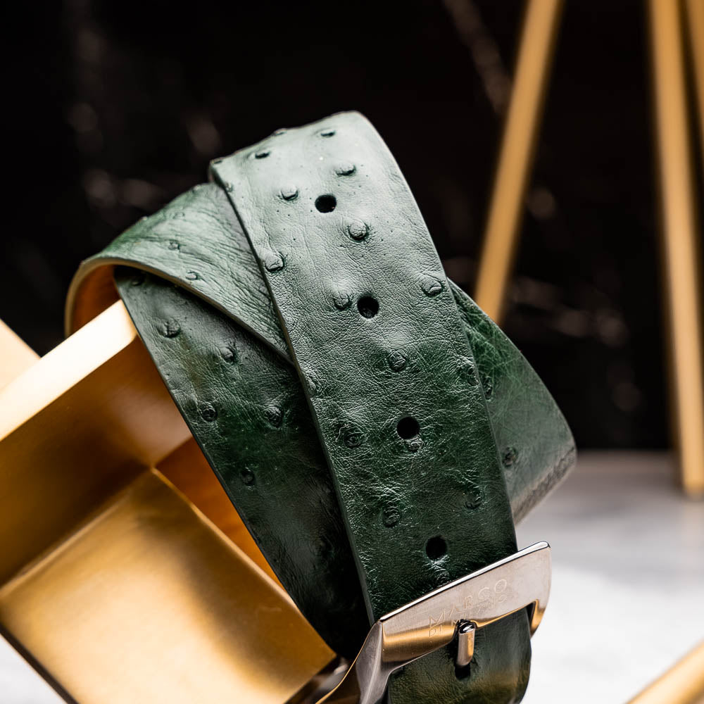 The Domenico Belt Forest Green by Marco Di Milano features textured ostrich leather and a silver buckle—an ideal match for your luxury footwear collection.