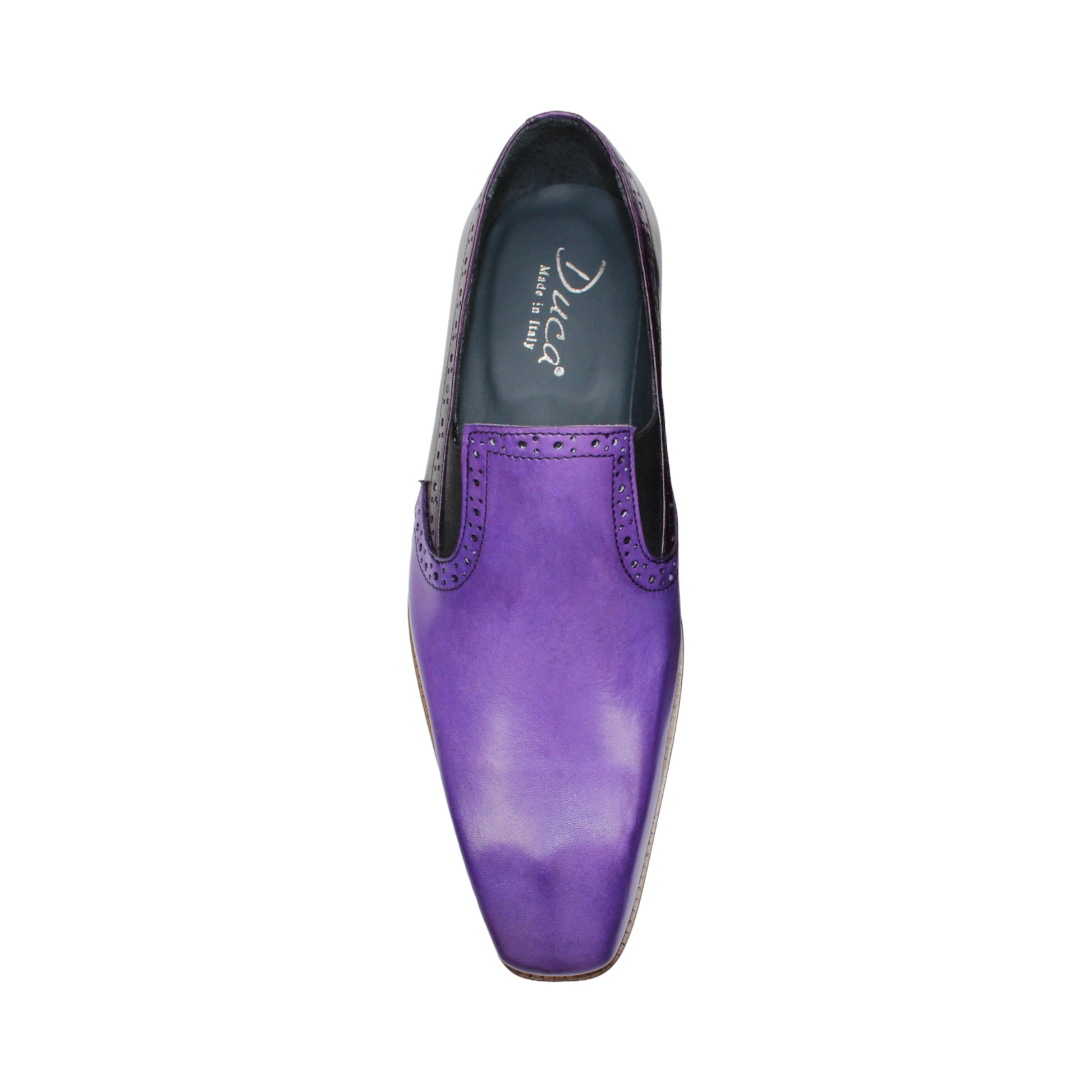 The Duca Di Matiste Duca Paliano Lavender/Purple is an Italian-made men's slip-on dress shoe in purple calf leather, with a darker purple heel, black elastic inserts, and a light brown sole for timeless style.