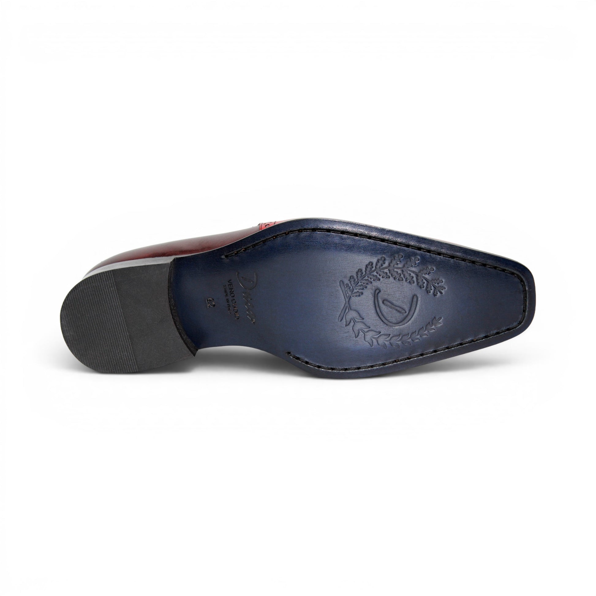 The Duca Di Matiste Duca Paliano Red/Burgundy is a men’s slip-on dress shoe in fine calf leather, featuring a red and dark brown upper with decorative perforations and a black low heel—Italian-made timeless style.