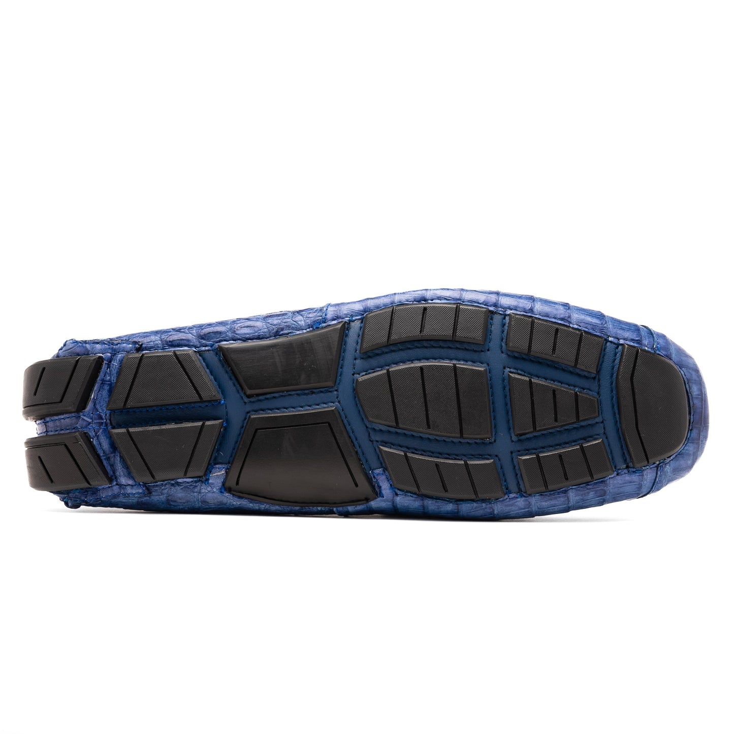 The Marco Di Milano Parma Blue Jeans loafers feature genuine blue caiman leather with a crocodile pattern, metal hardware accents, and rubber soles—ideal luxury footwear, displayed with one shoe upright and the other on its side.