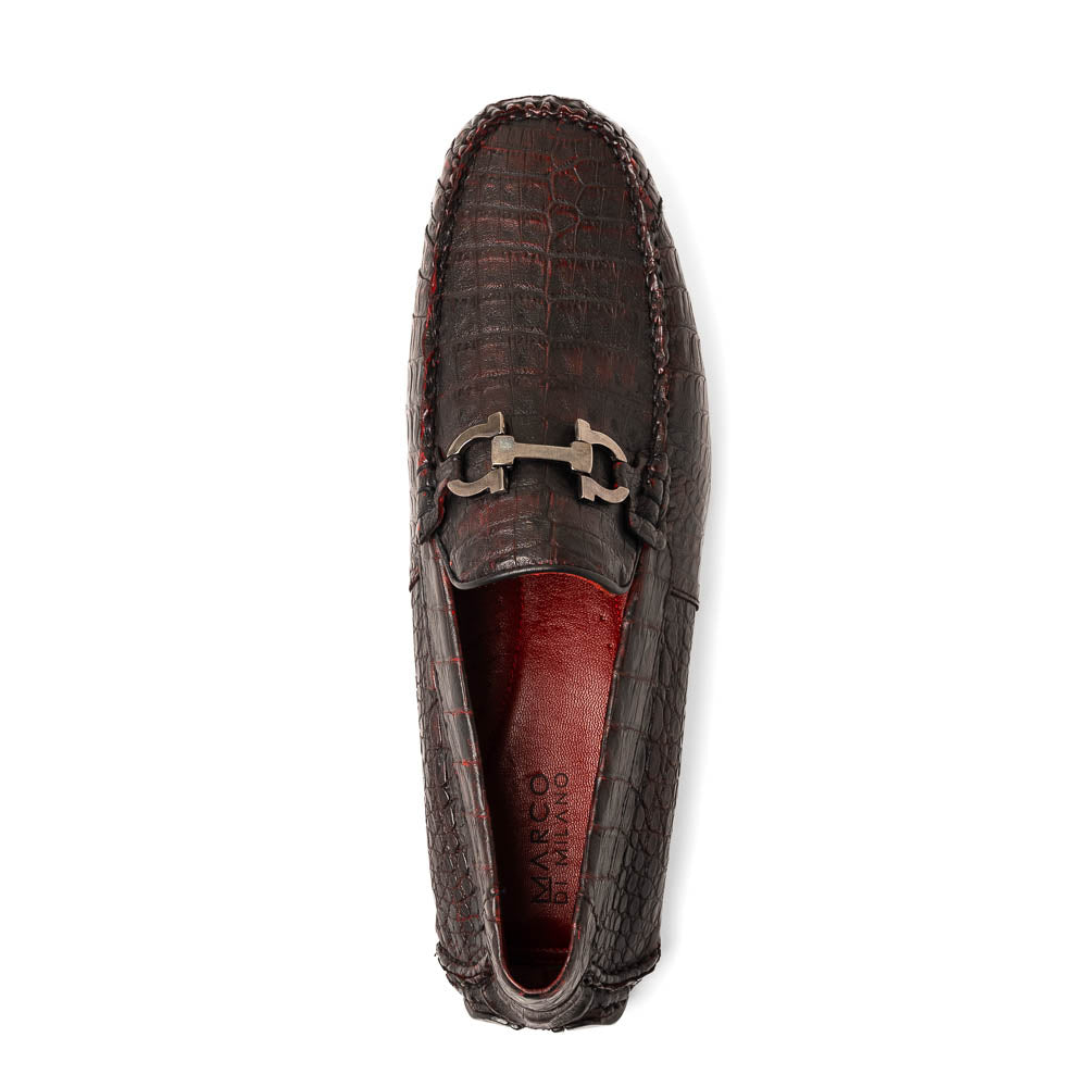 The Marco Di Milano Parma Blackcherry loafers feature genuine caiman leather with a crocodile pattern and metal buckle detail—luxury men's slip-ons shown upright and angled to display the sole, designed for effortless elegance.