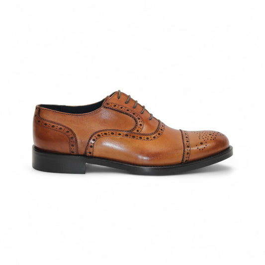 The Firmani Paul Cognac men's dress shoe by Firmani features genuine leather, decorative brogue detailing, black sole, and laces, displayed in a side profile view on a white background.
