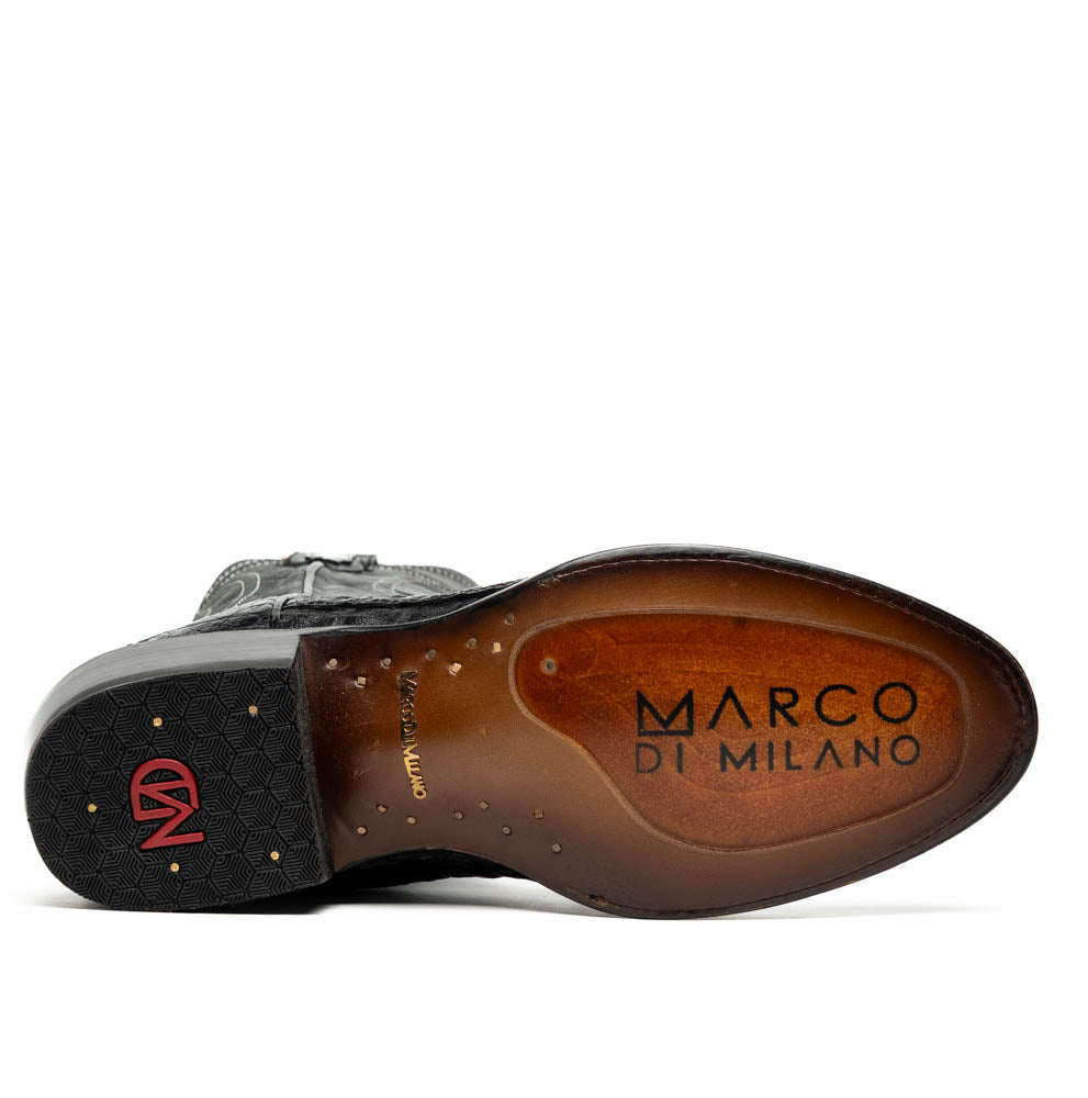 A pair of Phoenix Black Western cowboy boots by Marco Di Milano, one upright and one showing the sole, featuring a textured pattern and the brand name on the sole.