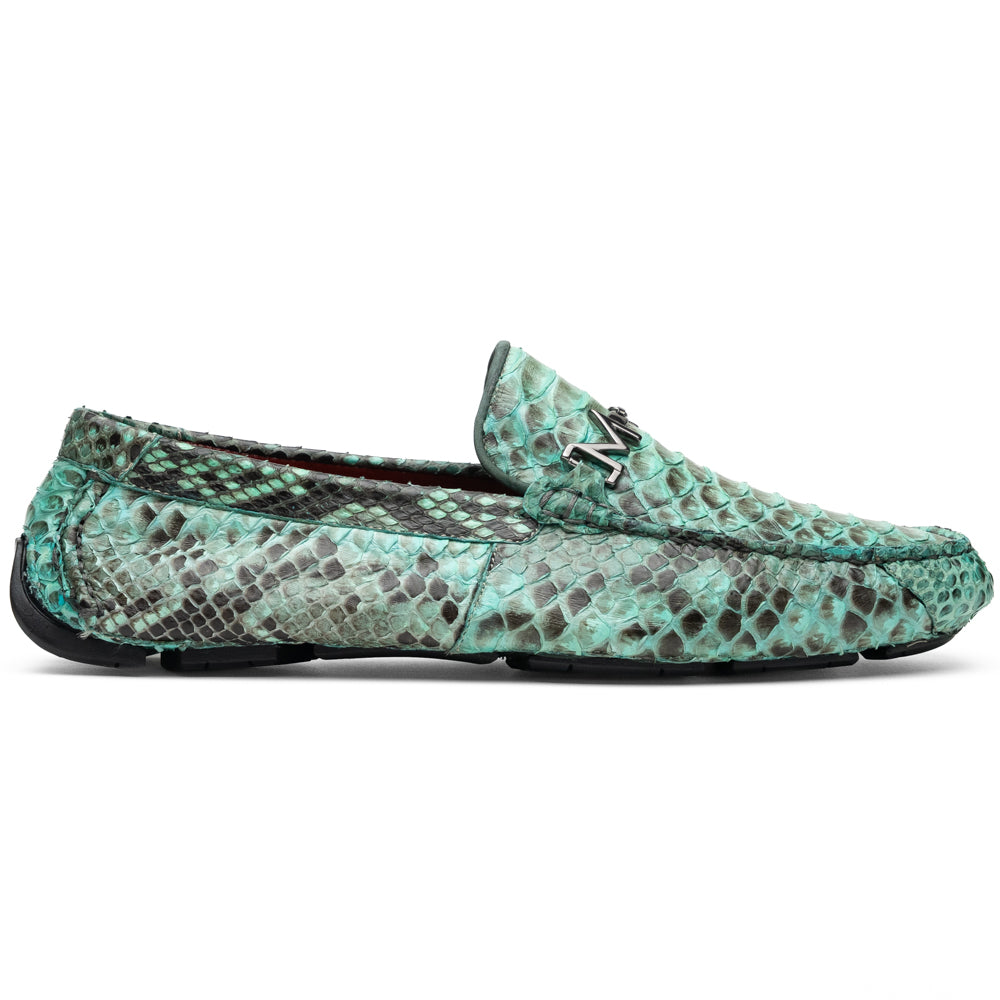 Introducing the Pia Aqua by Marco Di Milano—a pair of luxury men’s loafers handcrafted from striking green python skin. Featuring black rubber soles and silver buckle accents, one shoe is elegantly displayed on its side to highlight the distinctive design of this opulent driver shoe.