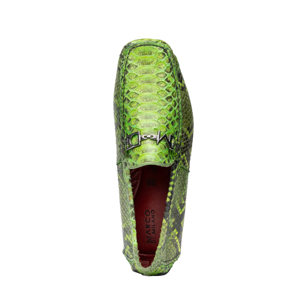 A pair of Marco Di Milano’s Pia Lemon Green driver shoes—crafted from green python skin with black soles and silver buckles—one upright and the other leaning gracefully, showcases the exquisite luxury of handcrafted men’s exotic footwear.