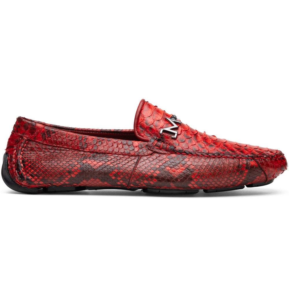 A pair of Pia Red loafers by Marco Di Milano—crafted as luxury men’s driver shoes in a striking red snakeskin pattern, featuring black rubber soles and silver buckle detailing, with one shoe upright and the other displayed on its side—showcase the allure of exotic python-inspired style in a distinguished design.