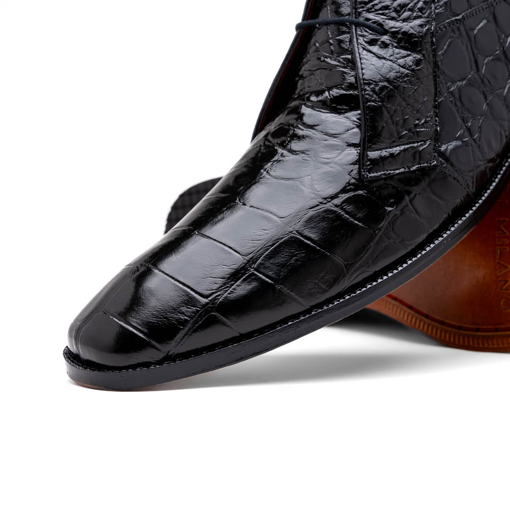 Experience luxury with Marco Di Milano's Pietro Black men's lace-up boots—crafted in black, crocodile-patterned leather with dark laces and brown leather soles.