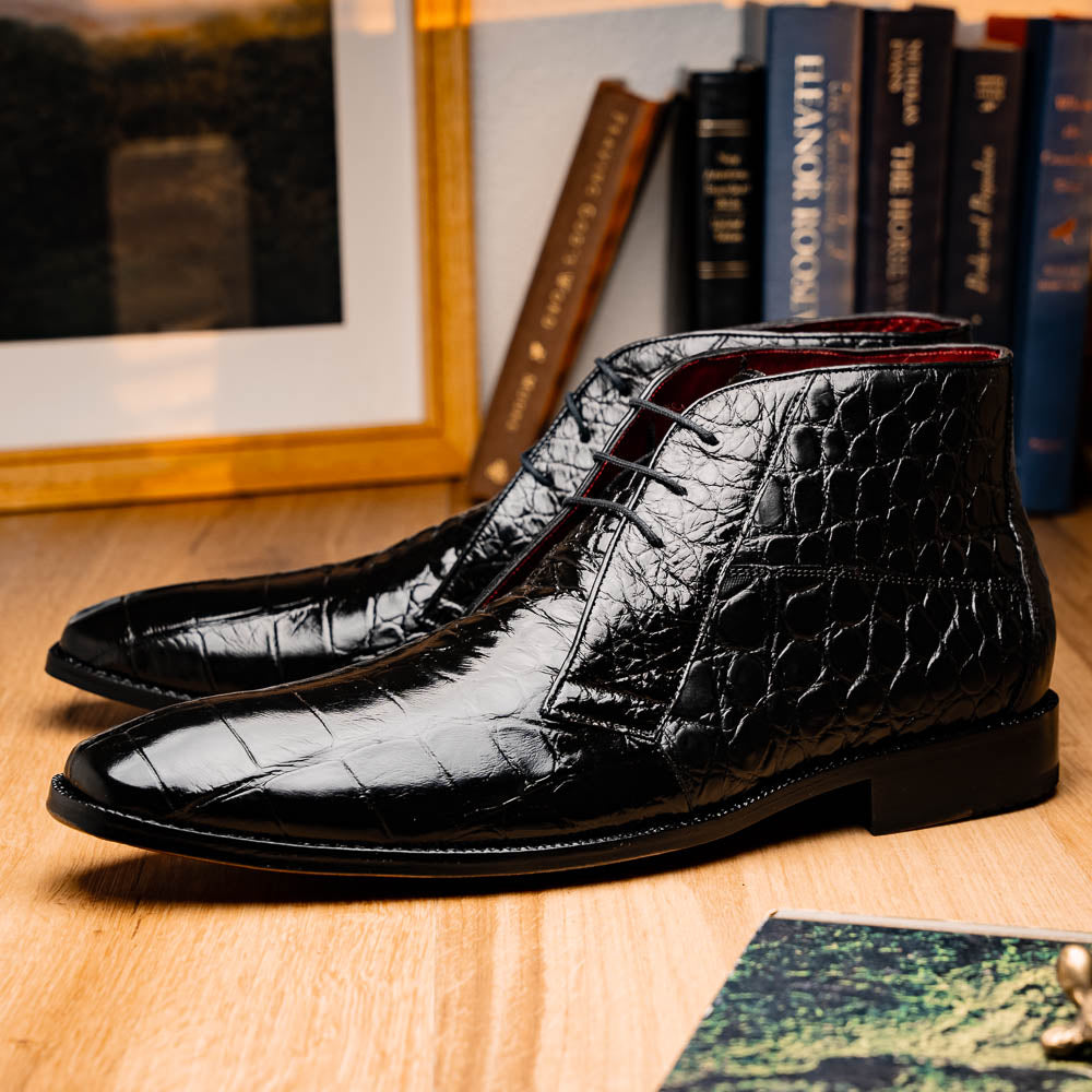 Experience luxury with Marco Di Milano's Pietro Black men's lace-up boots—crafted in black, crocodile-patterned leather with dark laces and brown leather soles.