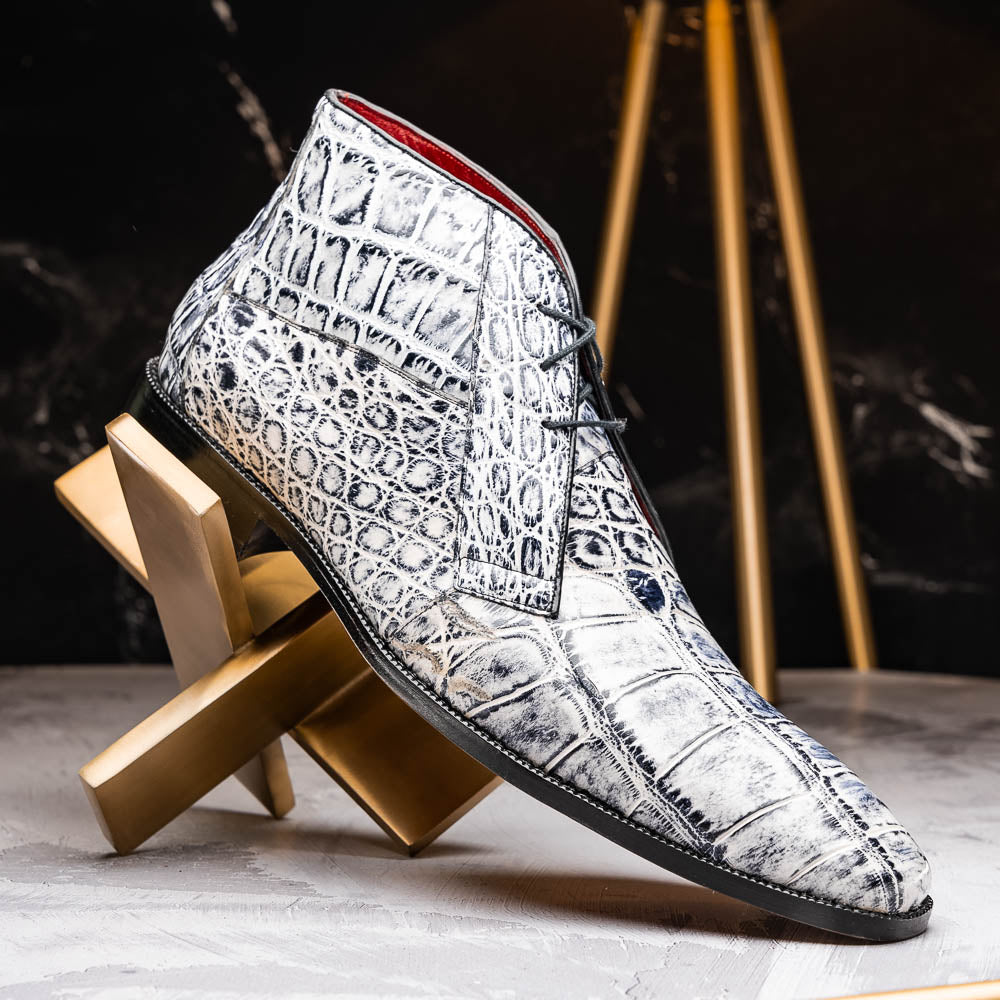 The Pietro Newspaper by Marco Di Milano: men's ankle-high dress boots with a white and black crocodile pattern, black laces, brown leather soles, and hand painted finishes—luxury footwear for a distinctive look.