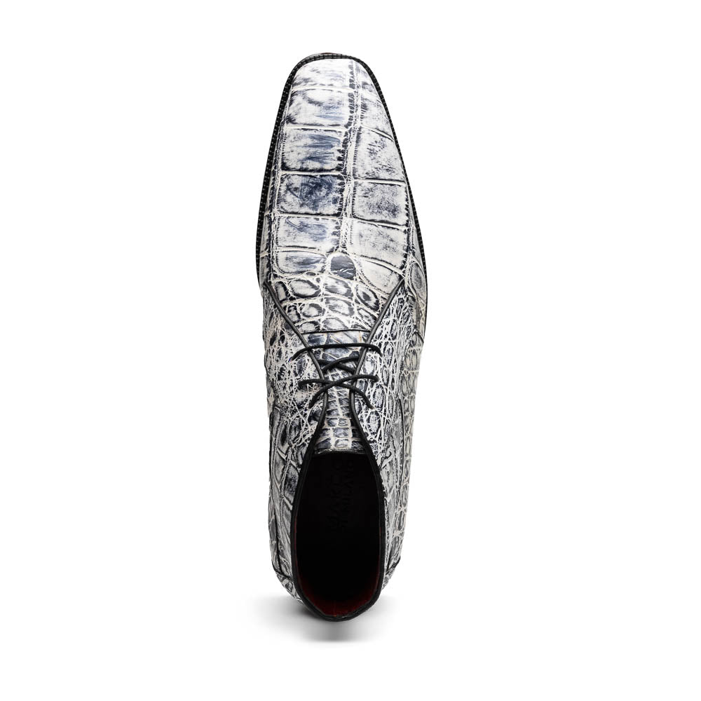 The Pietro Newspaper by Marco Di Milano: men's ankle-high dress boots with a white and black crocodile pattern, black laces, brown leather soles, and hand painted finishes—luxury footwear for a distinctive look.