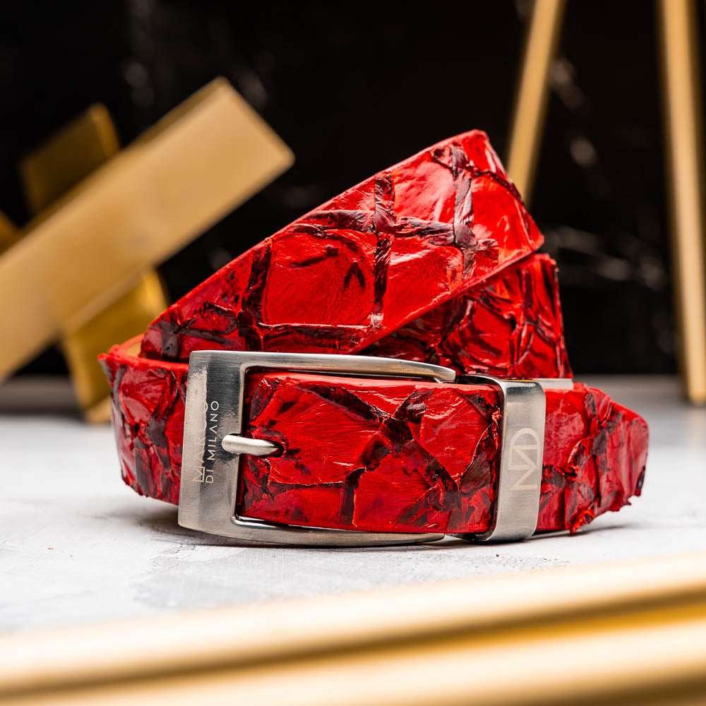 The Olivieri Belt Red by Marco Di Milano features textured genuine pirarucu leather and a metallic buckle with engraved branding, coiled on a white background—a signature accessory from this renowned luxury brand.