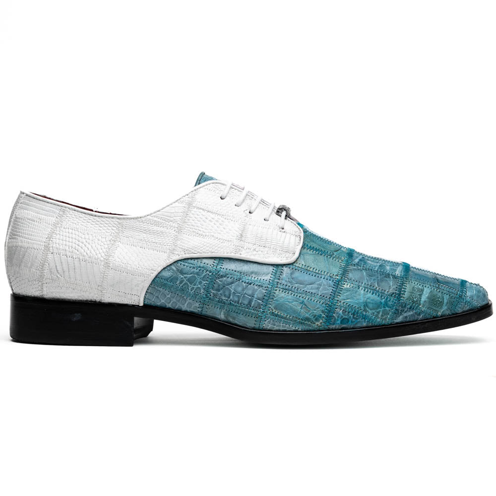 The "Pissa Aqua/White" by Marco Di Milano is a men's dress shoe with a white textured upper, teal blue patterned lower, hand-painted finishes, white laces, and a black sole—showcasing luxury style and craftsmanship.