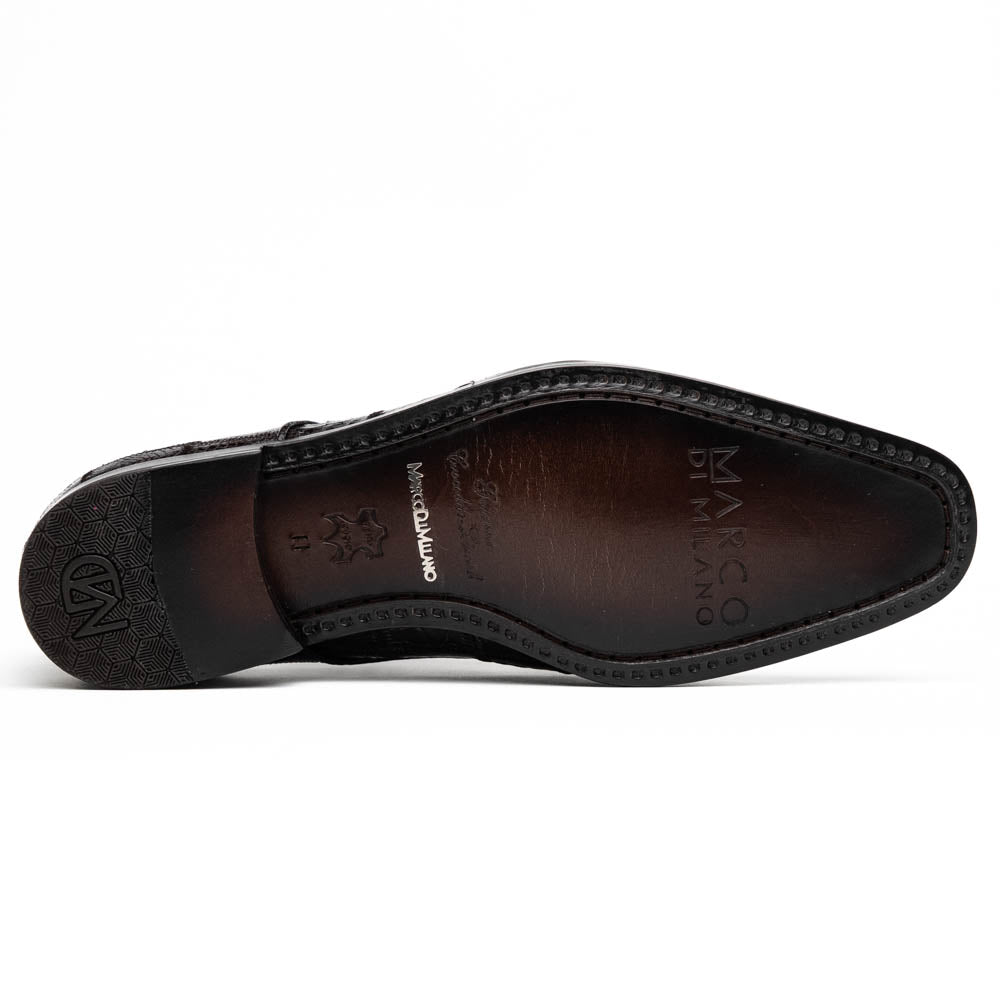 A pair of Marco Di Milano Pissa Brown textured leather dress shoes, with one shoe upright and the other on its side to showcase the sole.