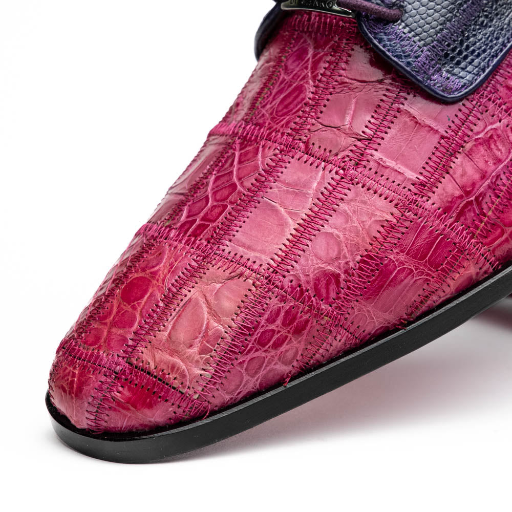 The Pissa Pink/Purple by Marco Di Milano are men's luxury dress shoes crafted from genuine exotics, featuring hand-painted pink and purple crocodile and lizard patterns—one shoe upright, the other on its side to display the sole.