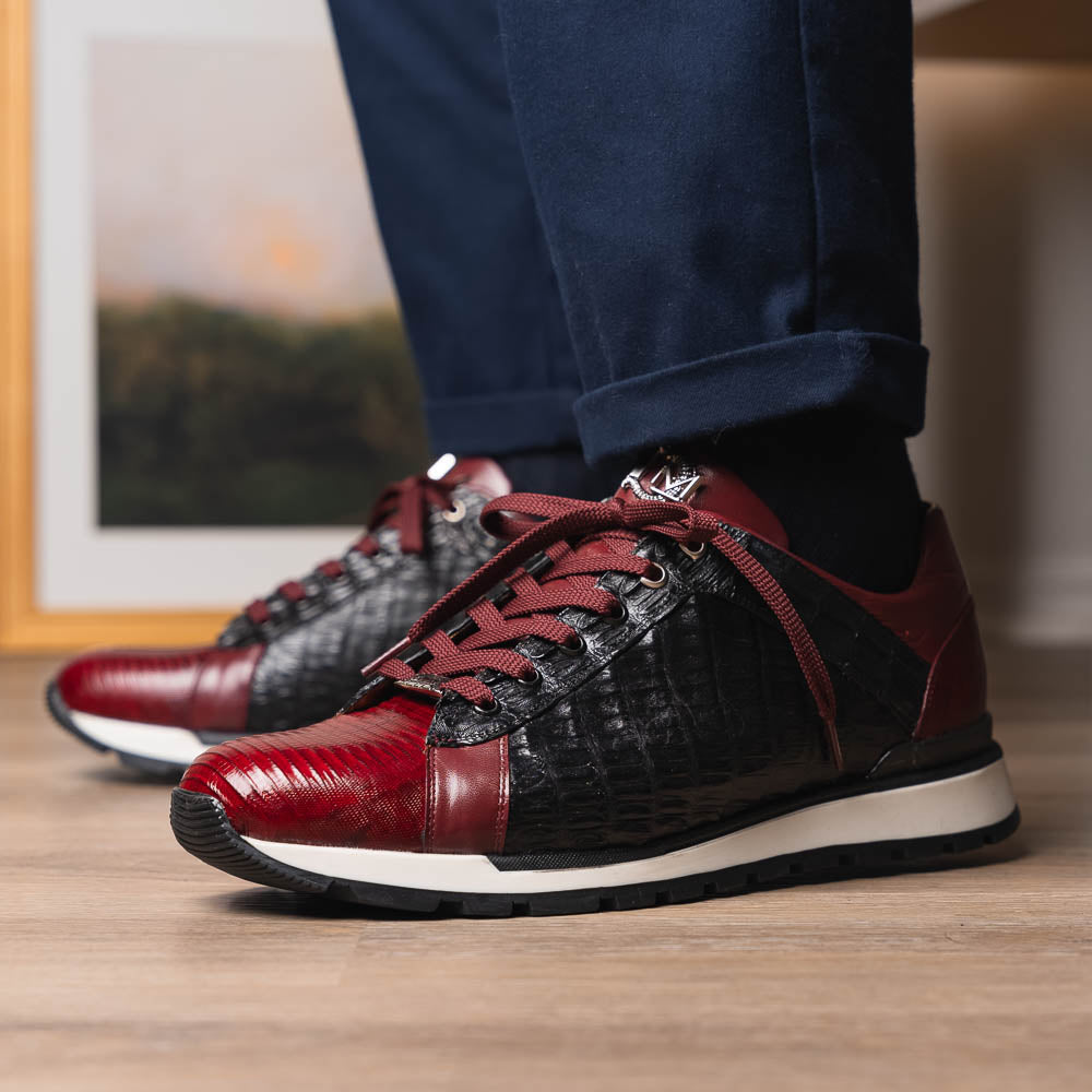 The Portici Wine / Black sneakers by Marco Di Milano are luxury shoes crafted from genuine crocodile leather with a hand-painted finish for a bold, standout look.