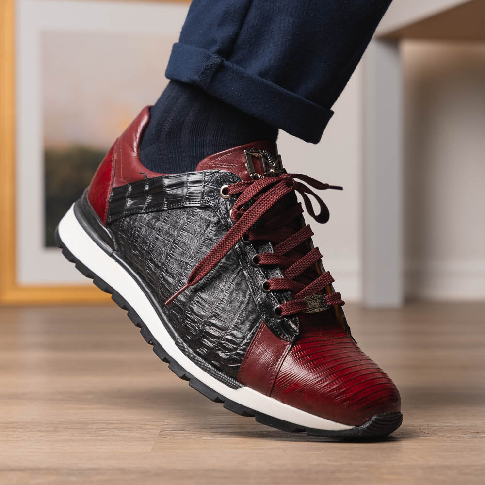 The Portici Wine / Black sneakers by Marco Di Milano are luxury shoes crafted from genuine crocodile leather with a hand-painted finish for a bold, standout look.