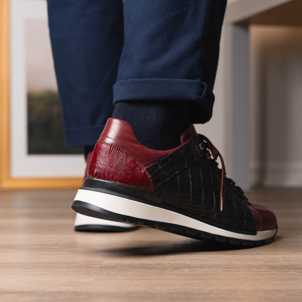 The Portici Wine / Black sneakers by Marco Di Milano are luxury shoes crafted from genuine crocodile leather with a hand-painted finish for a bold, standout look.
