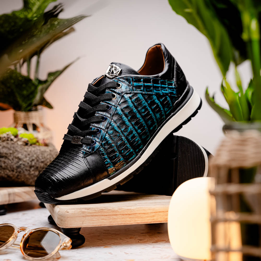 The Marco Di Milano Portici Navy / Black sneaker with black laces, a white midsole, and a textured black rubber outsole is shown on a plain white background, emphasizing its luxurious design.